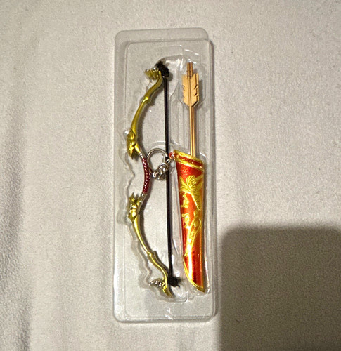 Gold metal bow - bow, keyring